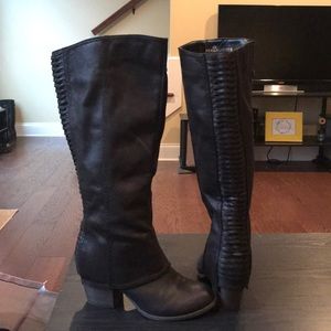 High black boots that zip on side